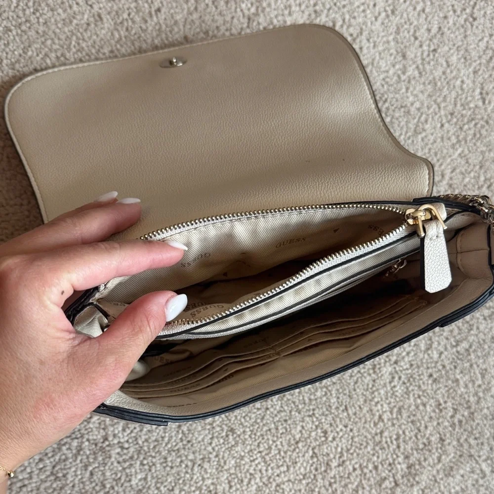 GUESS Cream Pebbled Leather Crossbody with Gold Triangle Logo